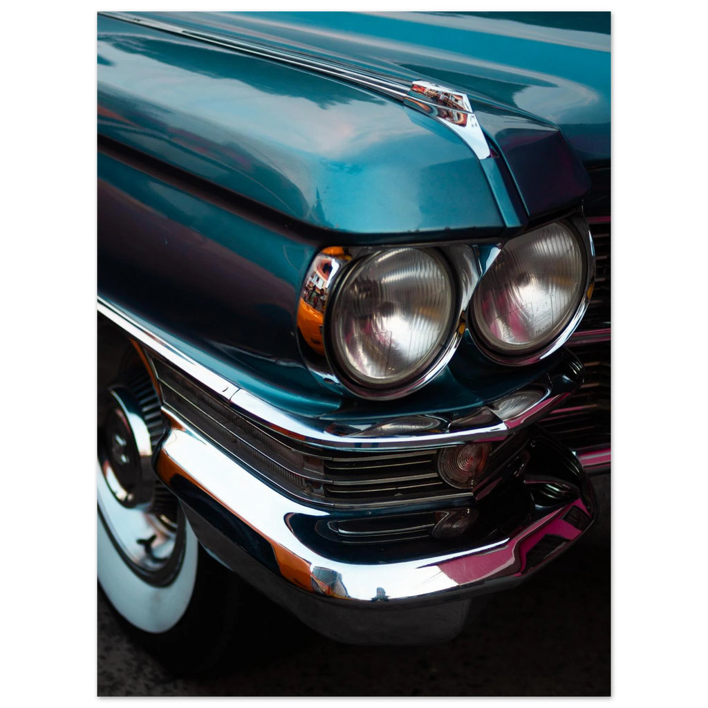 Close-up of a vintage car's front grille and headlights. Cadillac 1963 series 62