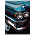 Close-up of a vintage car's front grille and headlights. Cadillac 1963 series 62