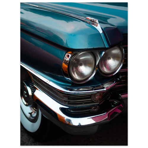 Close-up of a vintage car's front grille and headlights. Cadillac 1963 series 62